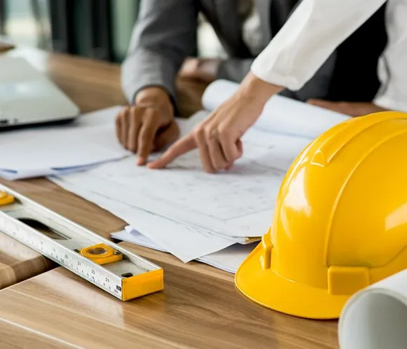 Contemporary luxury home featuring sleek lines, large glass windows, and panoramic views.