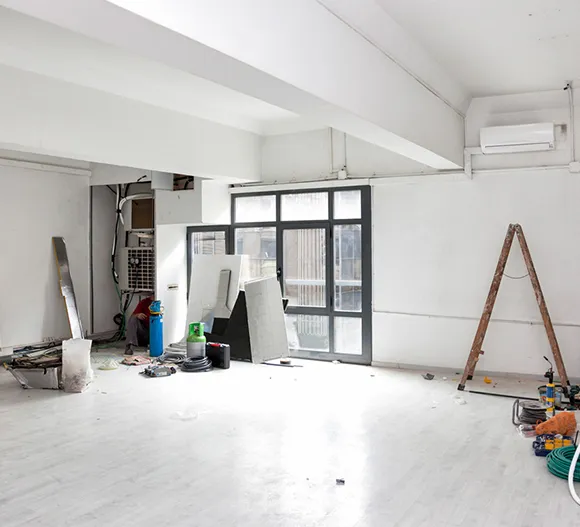 Professional home renovation experts update a bathroom with contemporary fixtures and design.